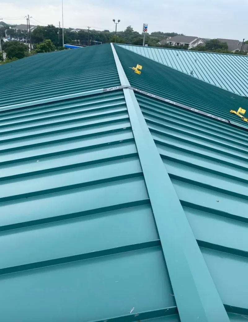 Green commercial metal roof ridge and valley for Metal Roof Repair in Odessa